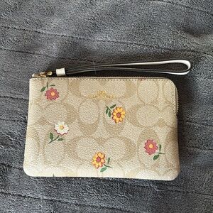 Coach tan with flowers wristlet